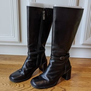 Black leather high heeled tall boots